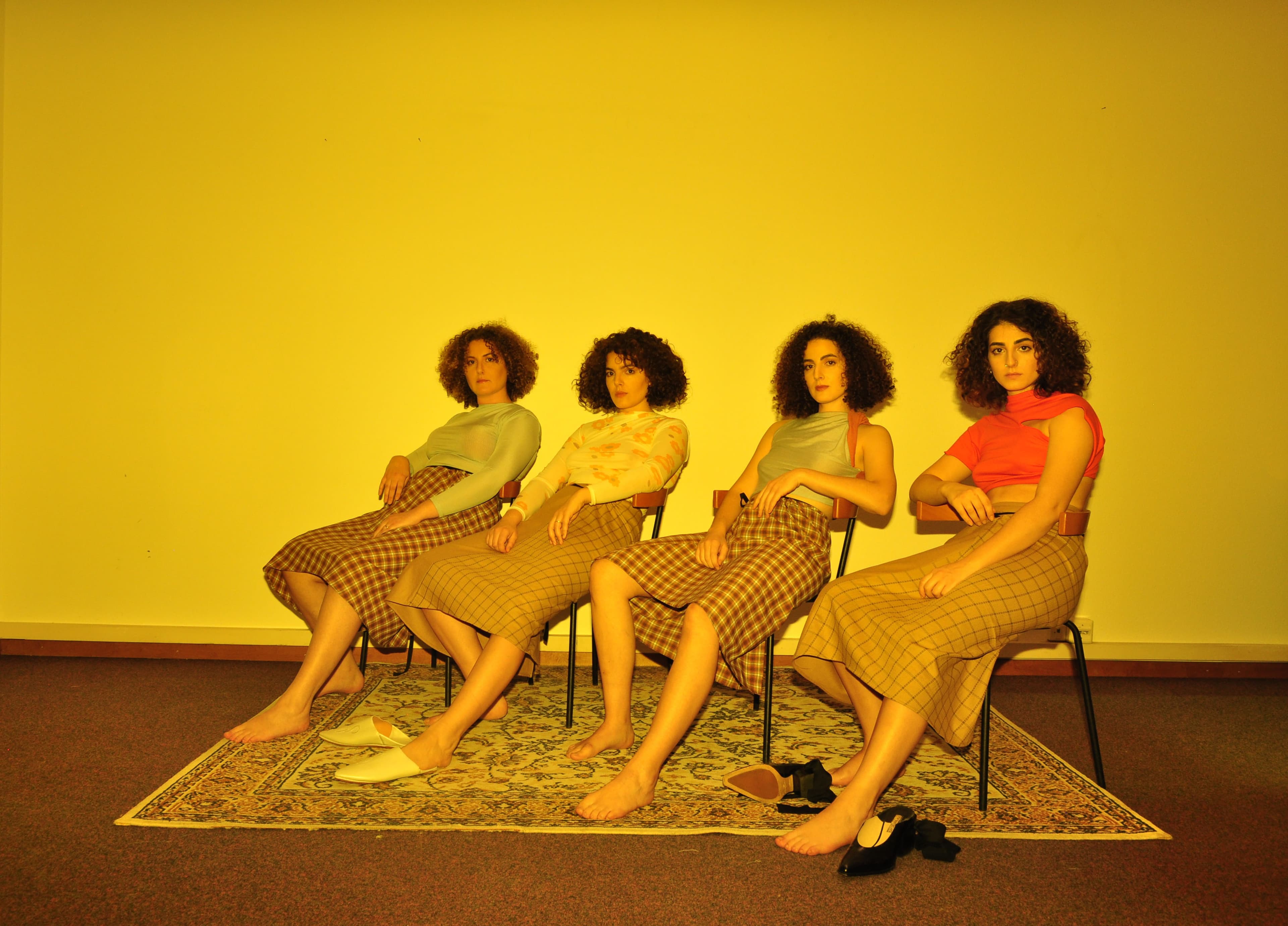 Living room with gray armchair and two-seater sofa